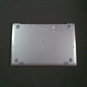 Carter gris dessous carte mère pc Asus E406S